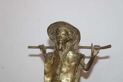 Statuette africaine vintage en métal doré – personnage porteur – H34 cm